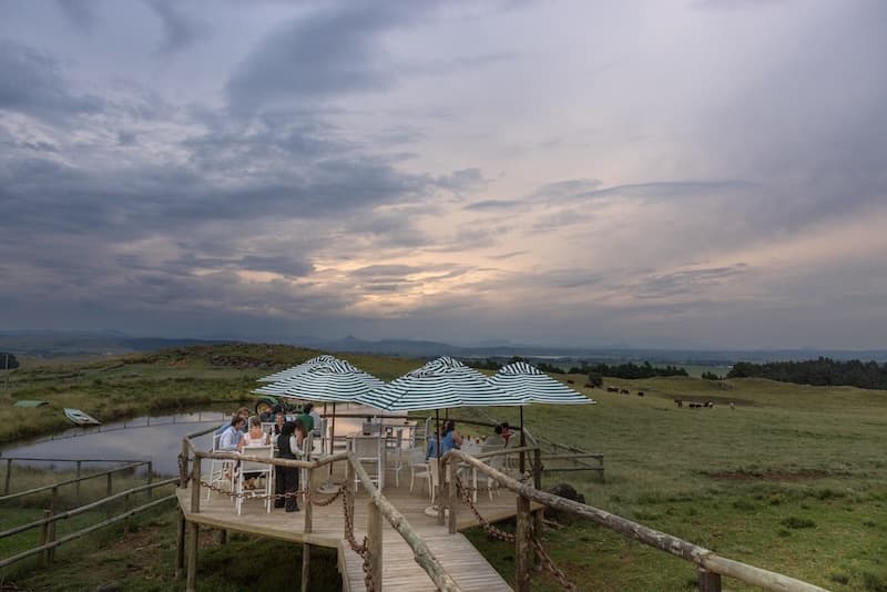 Outdoor terrace at Blueberry Cafe with views of the Drakensberg